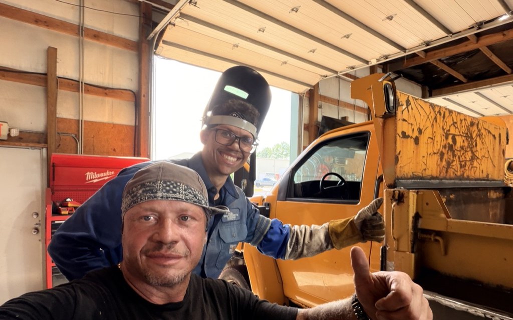 The McPhersons on the job, father and son